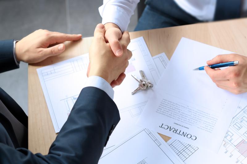 Double mandatement et mention dans le compromis